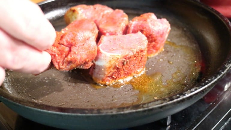 Pork fillet for the quick pork roast frying in the pan.