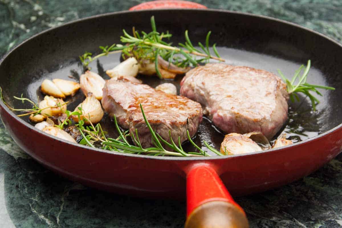 Veal escalope nature in a pan