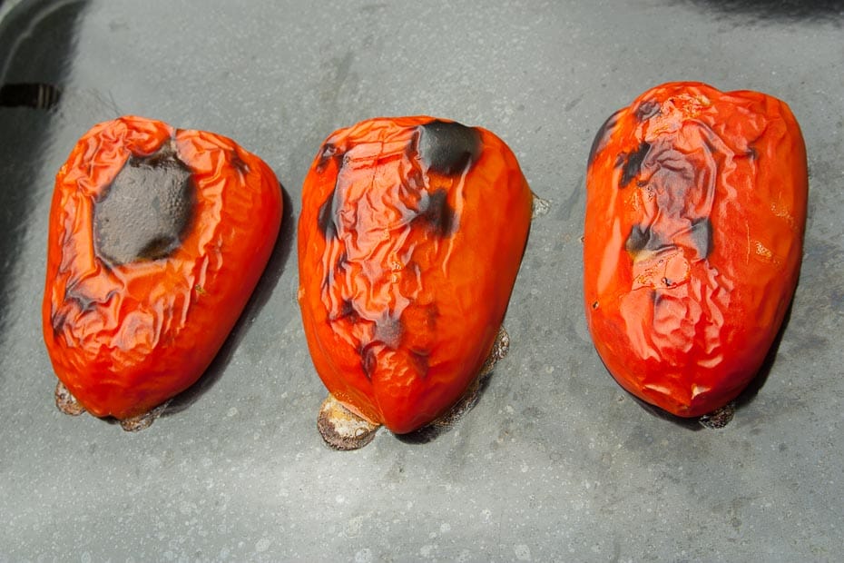 grilled peppers prepared for peeling
