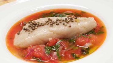 prepare fish in tomato sauce. recipe picture for article with vieos instructions