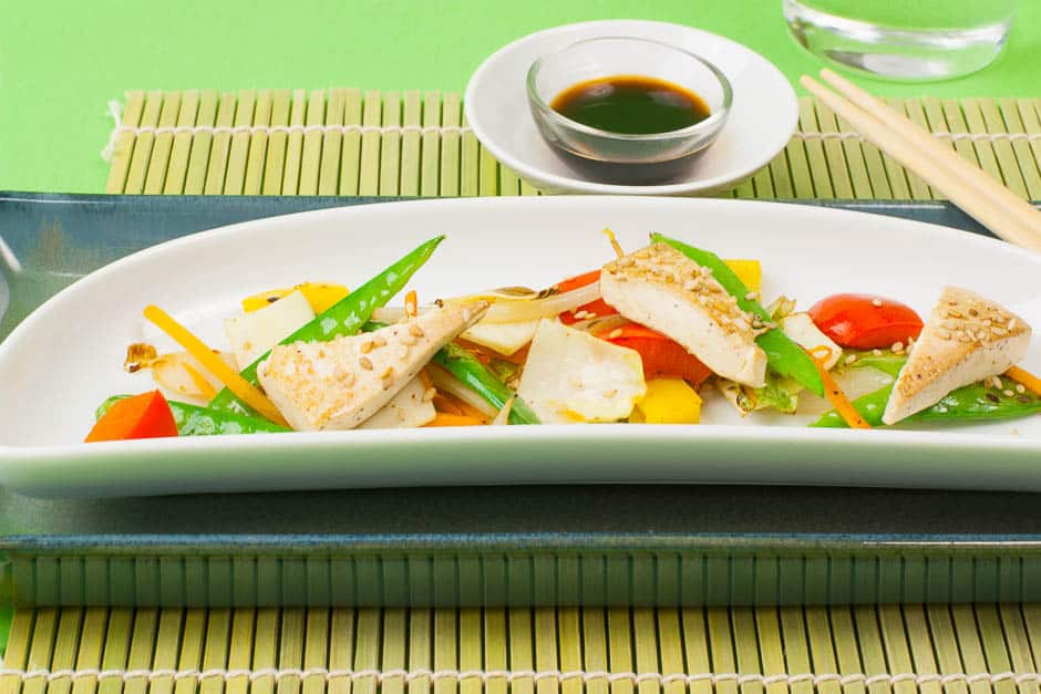 Pan-fried vegetables with tofu and served. © Thomas Sixt Food Photographer