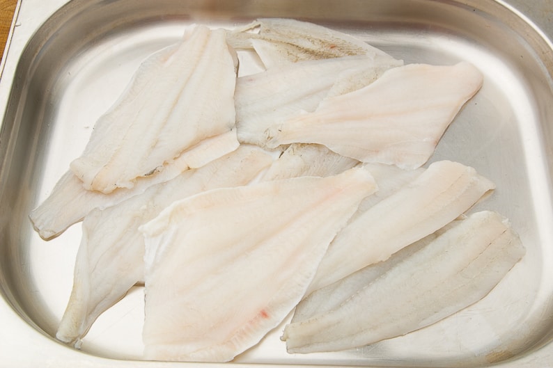 Fish fillets raw after thawing.