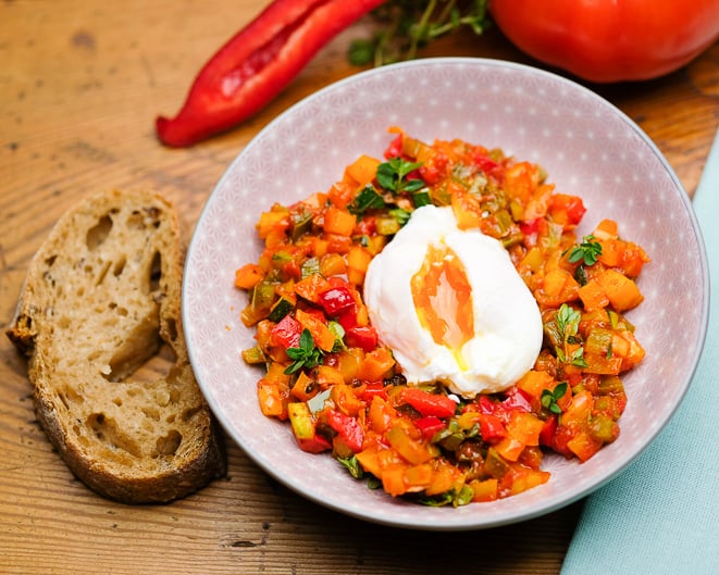 Serve the poached eggs with vegetables.