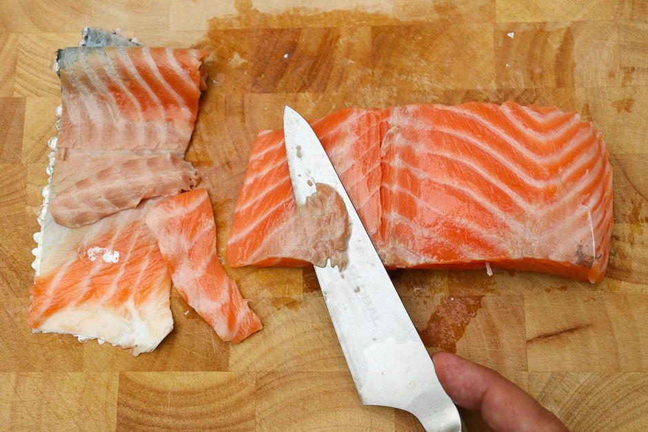 Clean the skinned salmon fillet.