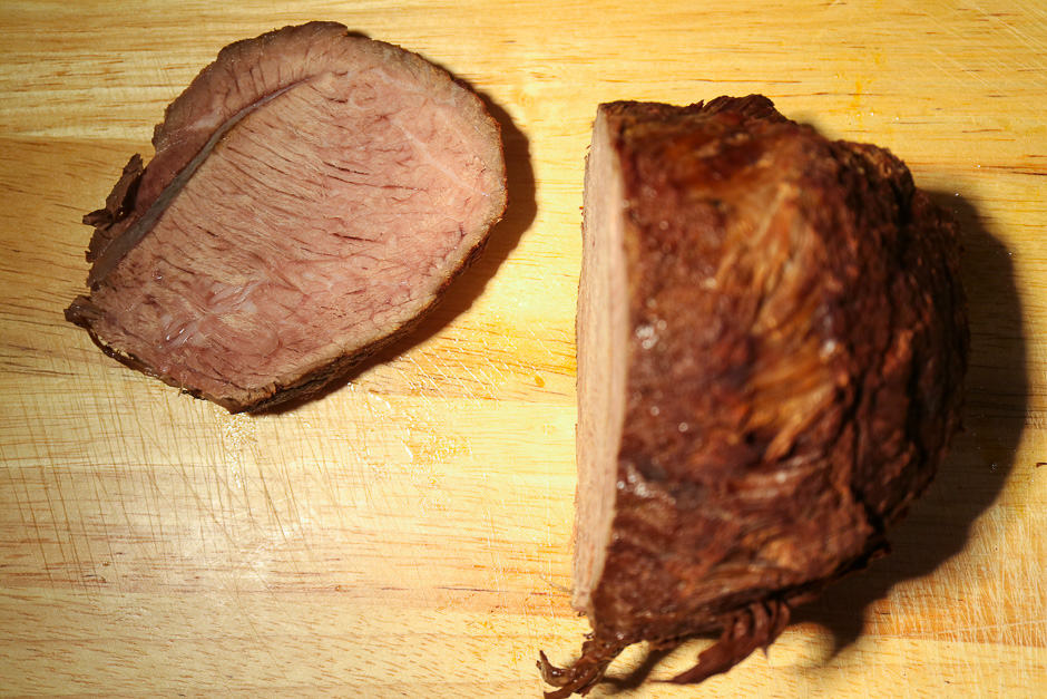 Cut the meat from the roast beef.