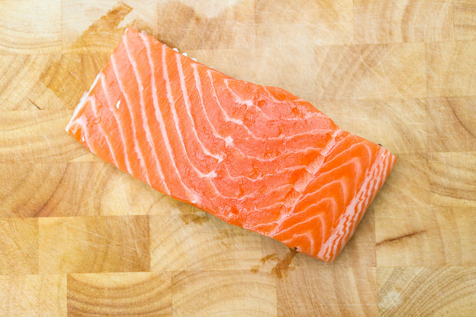 Fresh salmon fillet, skin side down