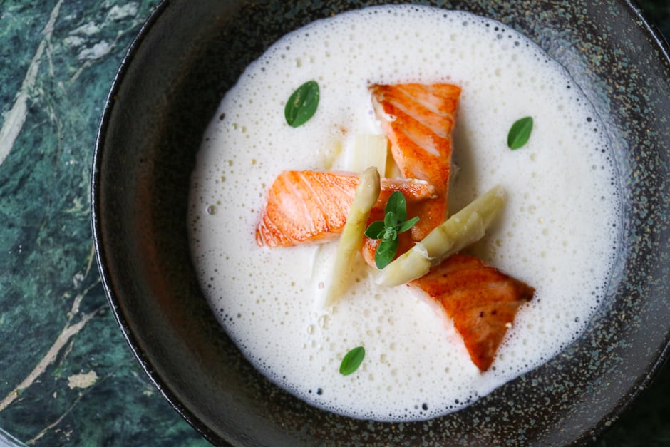 Cream of asparagus soup with salmon