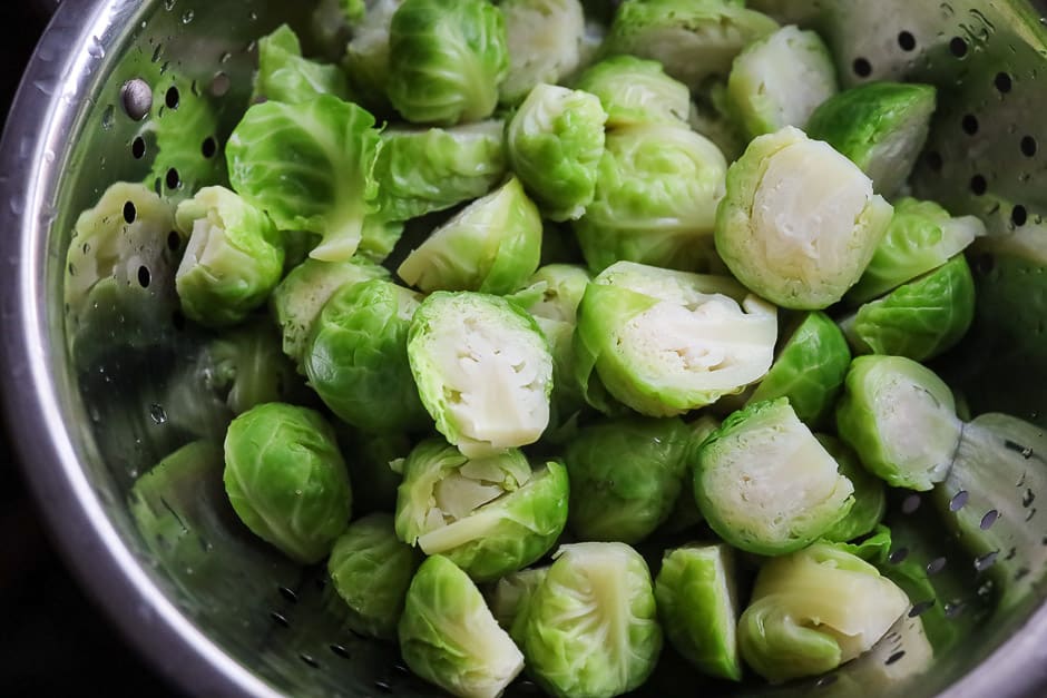 Blanch the Brussels sprouts