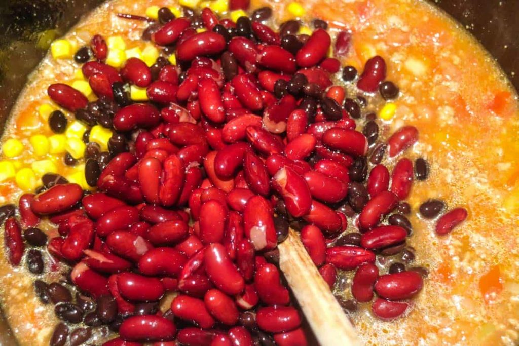 Add kidney beans and corn to the chilli set