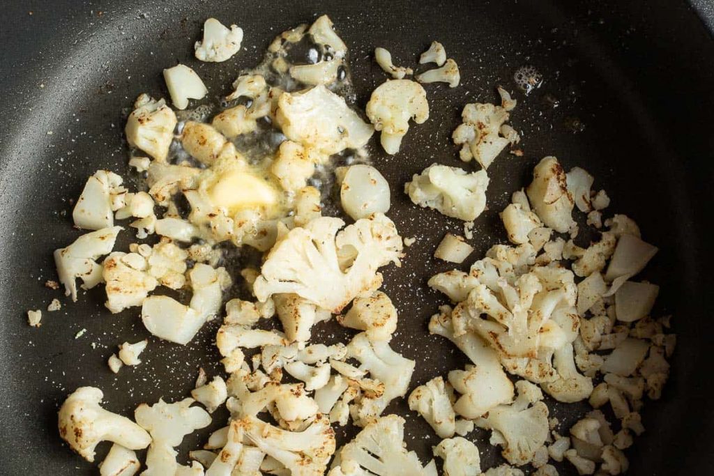 Roasted cauliflower scraps in the pan
