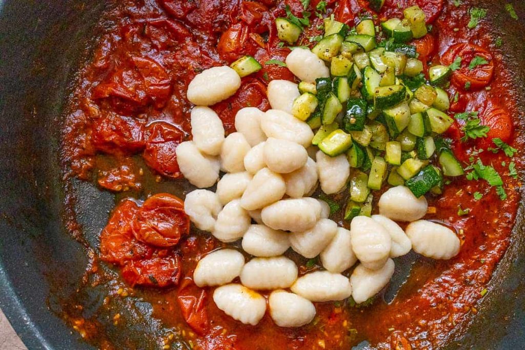 Gnocchi and zucchini in tomato sauce