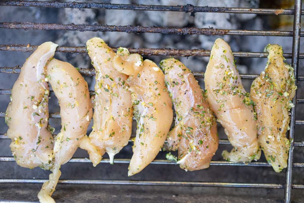 Marinated chicken on grill