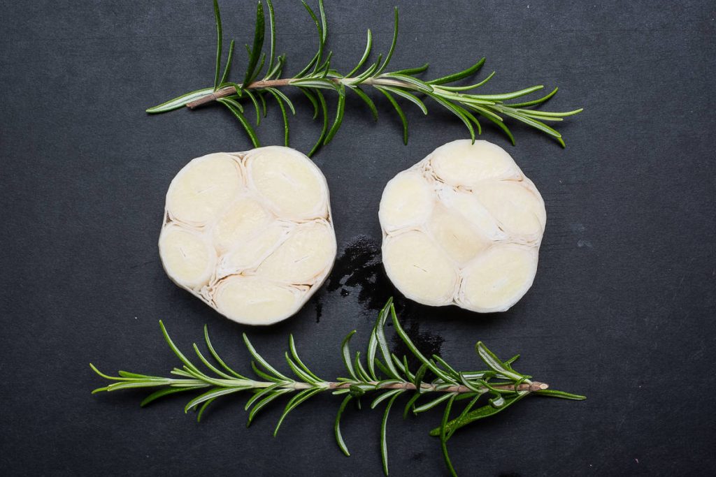 Fresh garlic cut in half