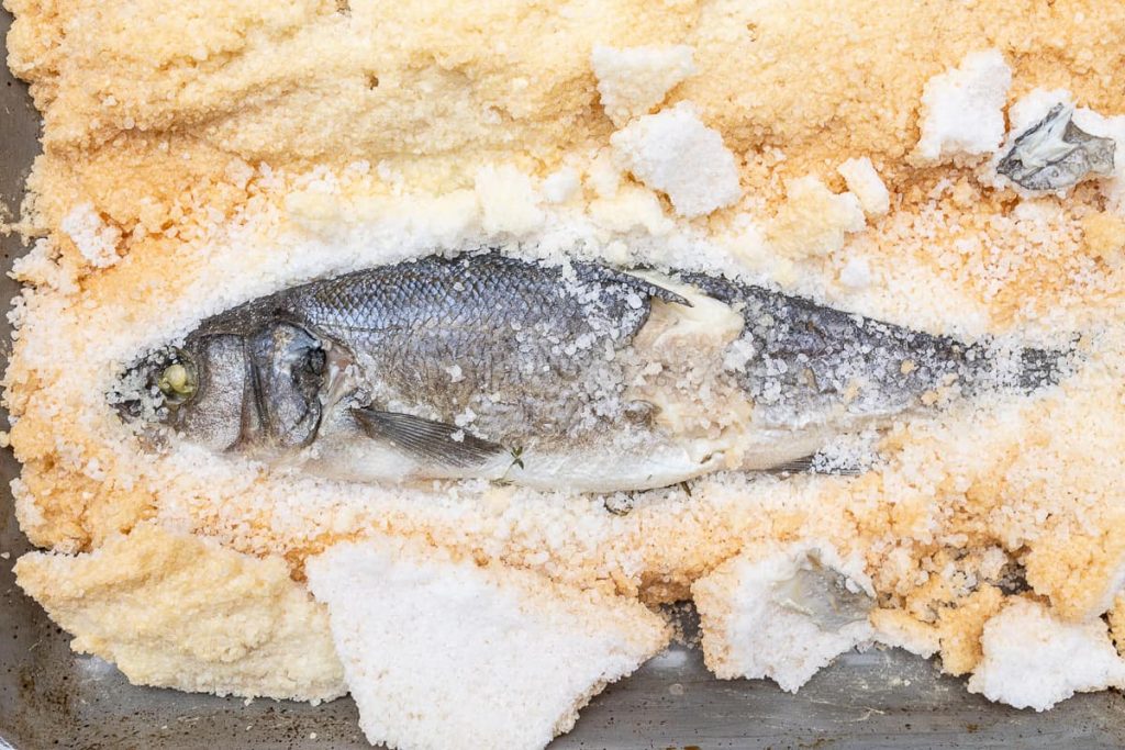 Fish in salt coat open