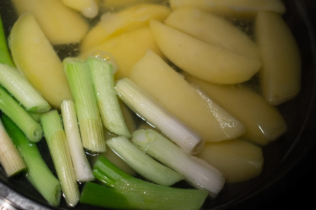Potatoes and spring onions