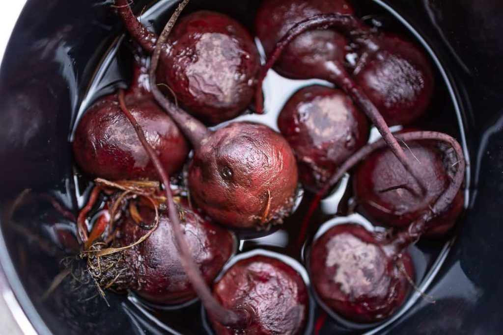 Beetroot cooking in a pot