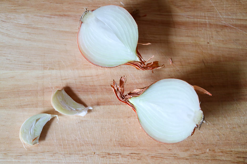 Halved garlic and halved onion.