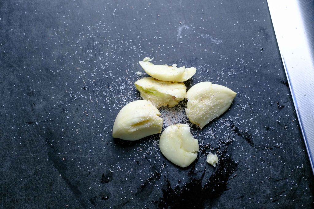 Garlic cloves with salt