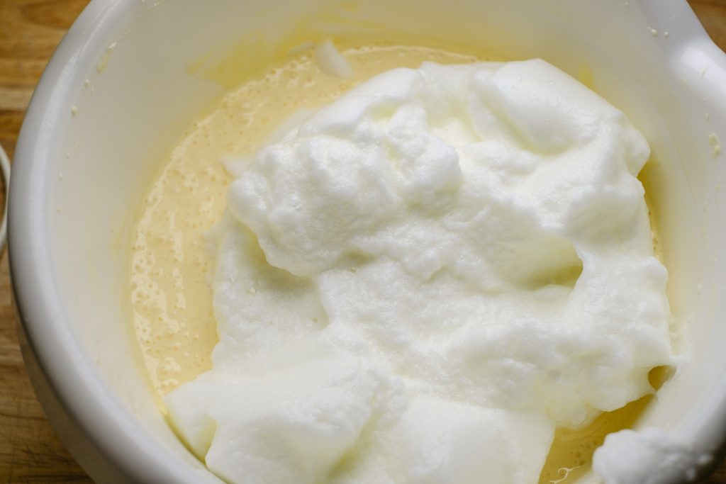 Whipped egg whites to the tiramisu mixture