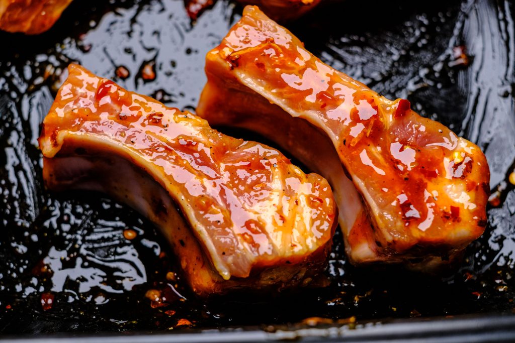 Raw, sweet and spicy marinated ribs