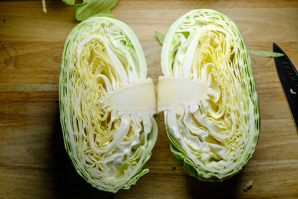 Fresh white cabbage cut in half