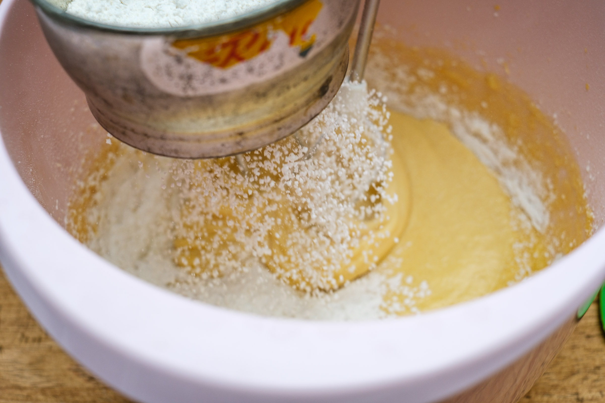 Detail sift flour into the dough
