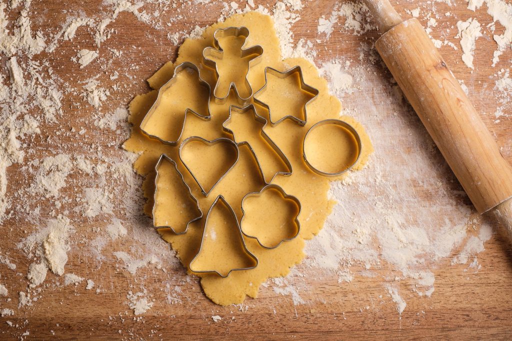 Christmas cookie cutters on the dough