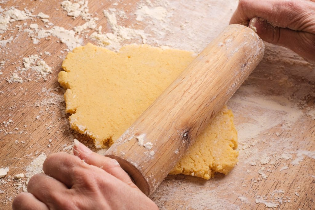 Roll out the dough for Christmas cookies