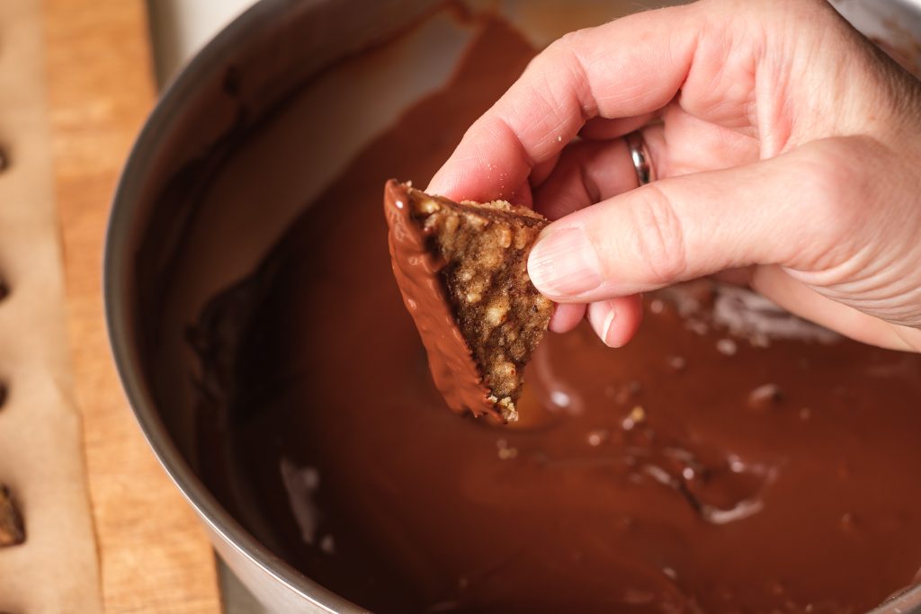 Dip nut wedges in chocolate