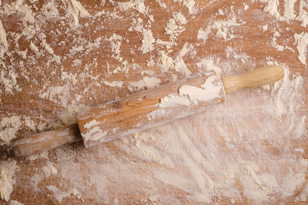 Rolling pin and work surface with flour