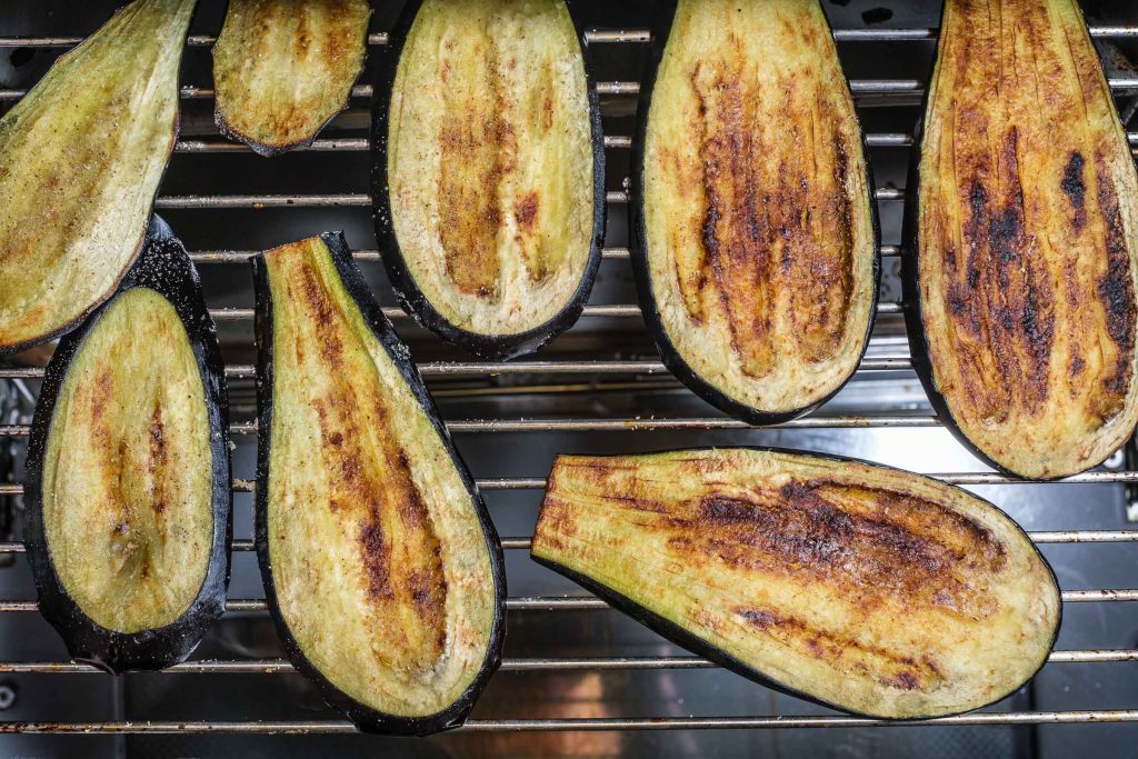 Fried eggplant slices on the oven grate