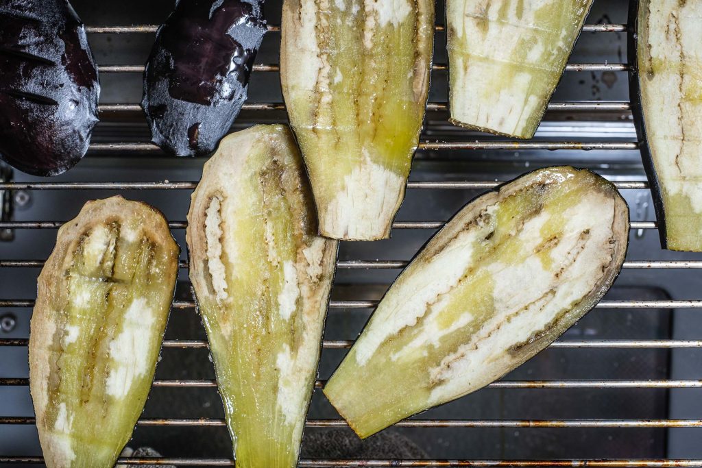 Aubergine Eggplant slices turned for frying
