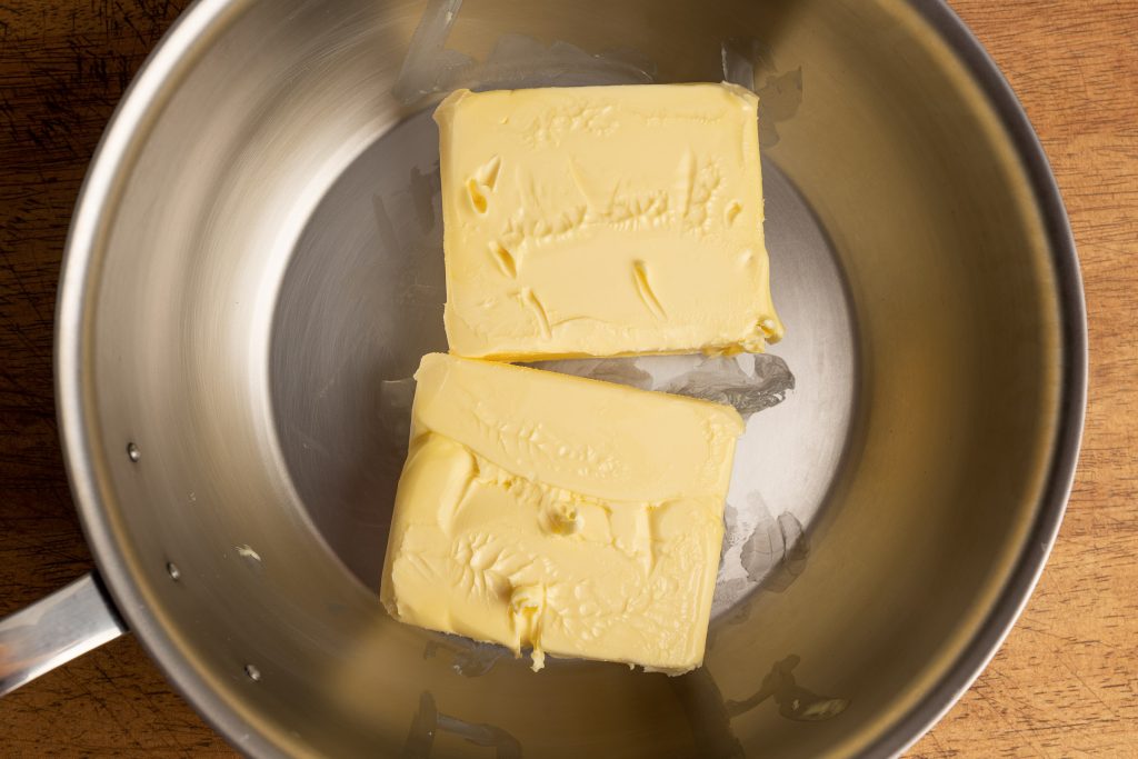 Butter for ghee – clarified butter in a pot