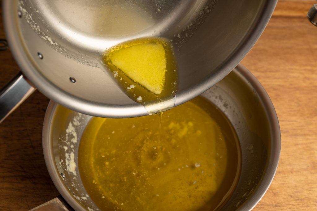 Drain the clarified butter and reserve the whey