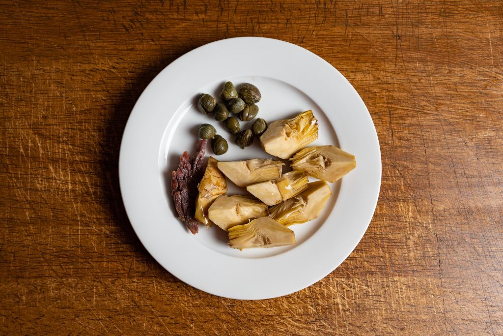 capers, artichokes, anchovies for a mediterranean pasta salad
