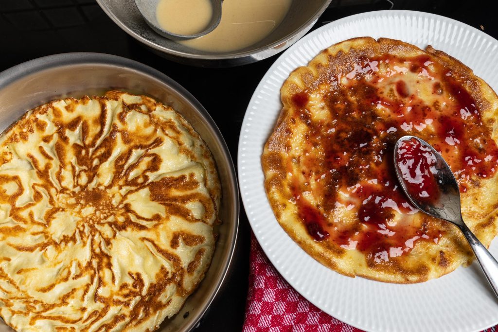 Spread pancakes with jam