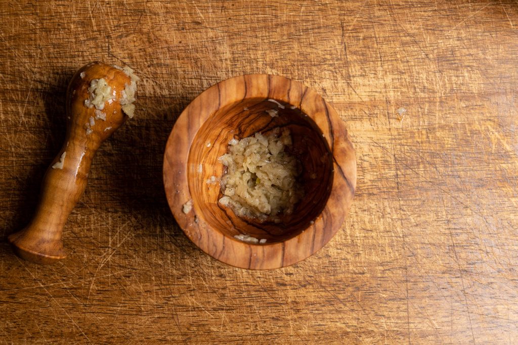 Garlic crushed in a mortar