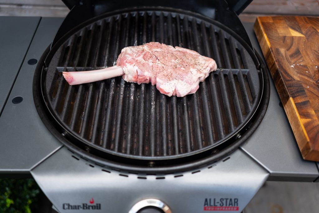 Veal chop placed on the All-Star Char-Broil Grill grill